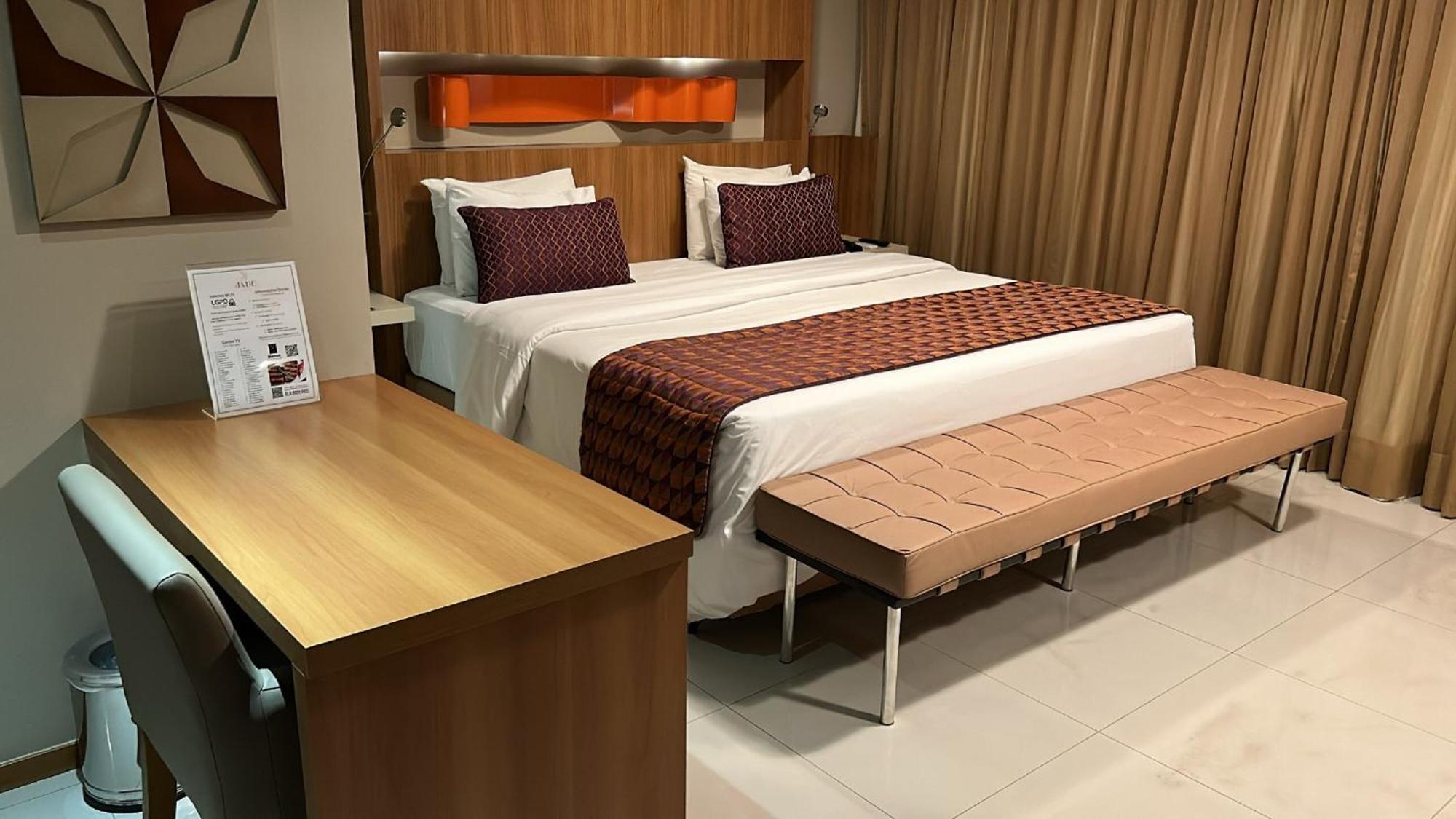 Jade Hotel Brasilia Candangolandia Bagian luar foto A bedroom at the hotel